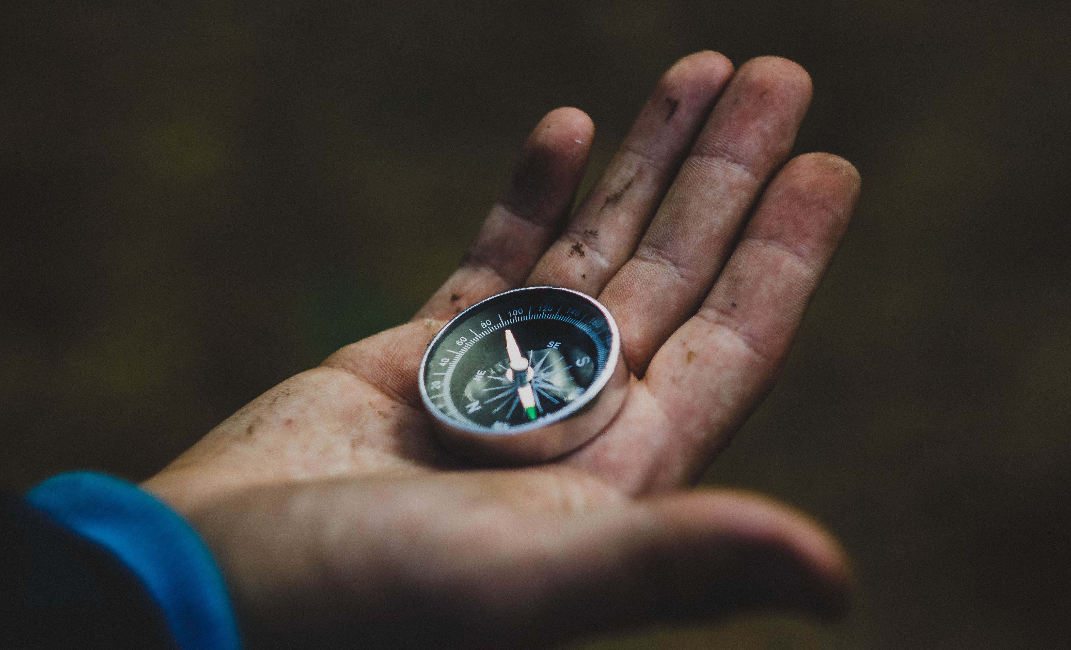 Canva – Person Holding Gray And Black Compas (2)